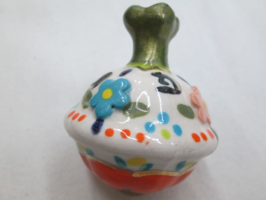 Hanukah Dreidel Ceramic Garlic Sevivon handmade. Handmade glazed ceramic sevivon made by Ora. Handmade glazed ceramic dreidel garlic shape with flowers.