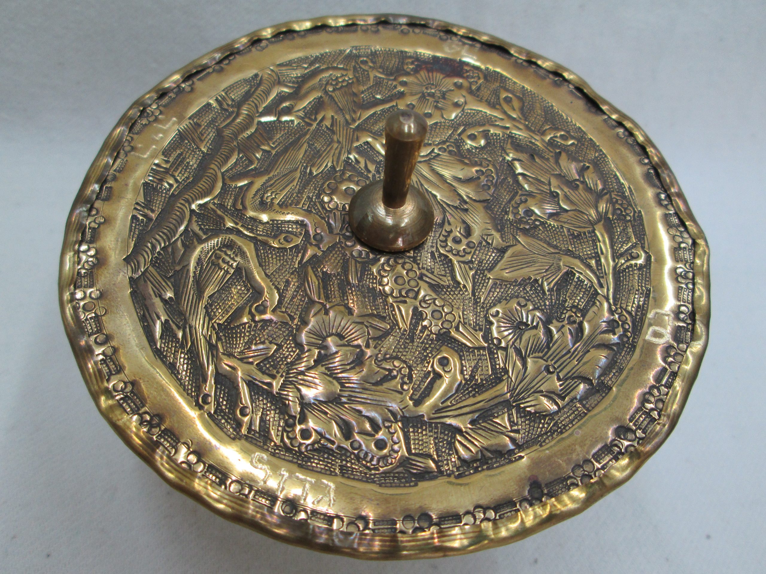 Chanuka Dreidel Sevivon Brass handmade. Hammered with floral designs all around dreidel made in Israel early 1950’s. Very rare item.