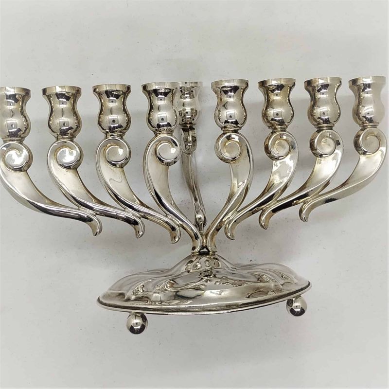 Silver Menorah Modern Design handmade. Sterling silver menorah modern design smooth wavy look. Dimension 26 cm X 10.5 cm X 15.8 cm approximately.