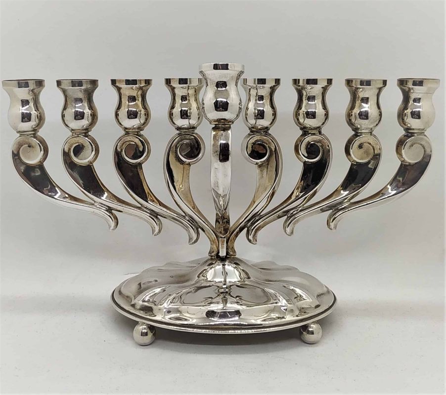 Silver Menorah Modern Design handmade. Sterling silver menorah modern design smooth wavy look. Dimension 26 cm X 10.5 cm X 15.8 cm approximately.