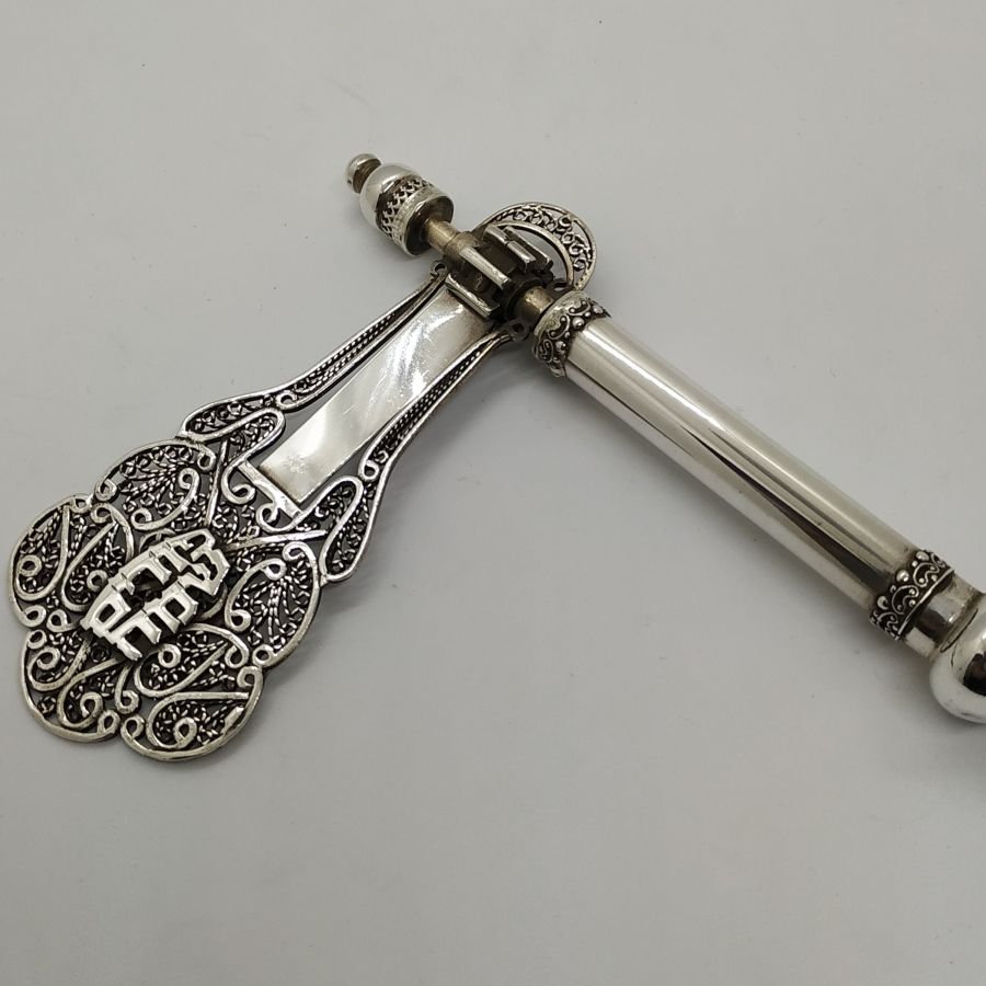 On back side of Purim Raashan sterling silver is written in Hebrew " Happy Purim". Dimension 12.1 cm X 5.3 cm X 2 cm approximately.