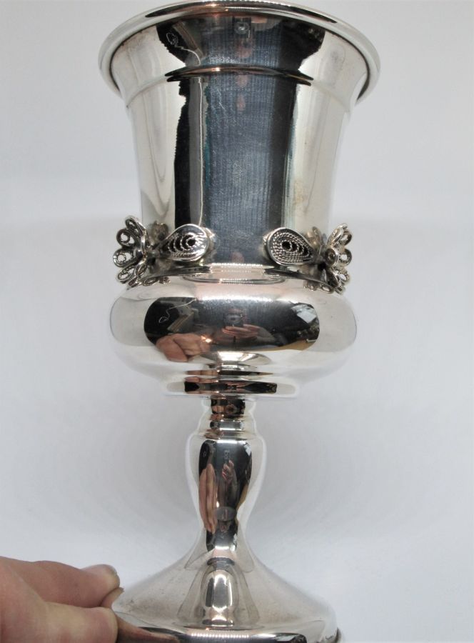 Handmade sterling silver filigree flowers Kiddush chalice with filigree flowers designs around. Dimension diameter 7.2 cm X 14 cm approximately