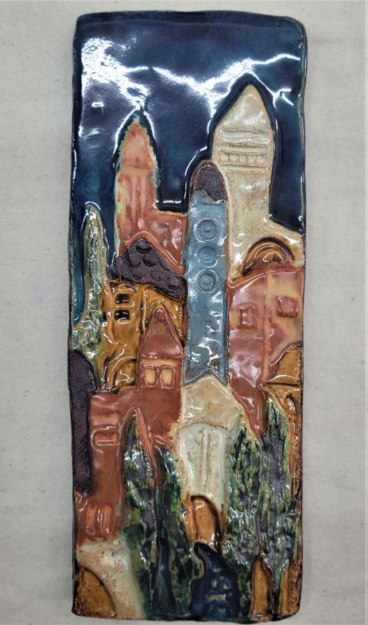 Handmade glazed ceramic tile rectangular Jerusalem houses city of Jerusalem with its different ages structures . Dimension 9 cm X 23 cm approximately.
