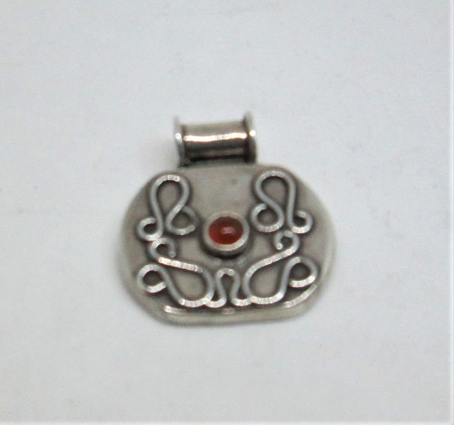 Handmade Pendant Sterling Silver Agathe set with orange Agathe stone and surrounded with Yemenite filigree design 2.25 cm X 1.7 cm X 0.4 cm.