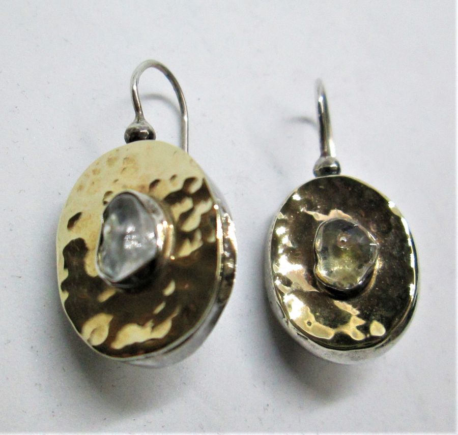 The hook in green crystal earrings contemporary style can be changed to silver screw finding for non pierced ears by request 1.4 cm X 1.3 cm approximately.