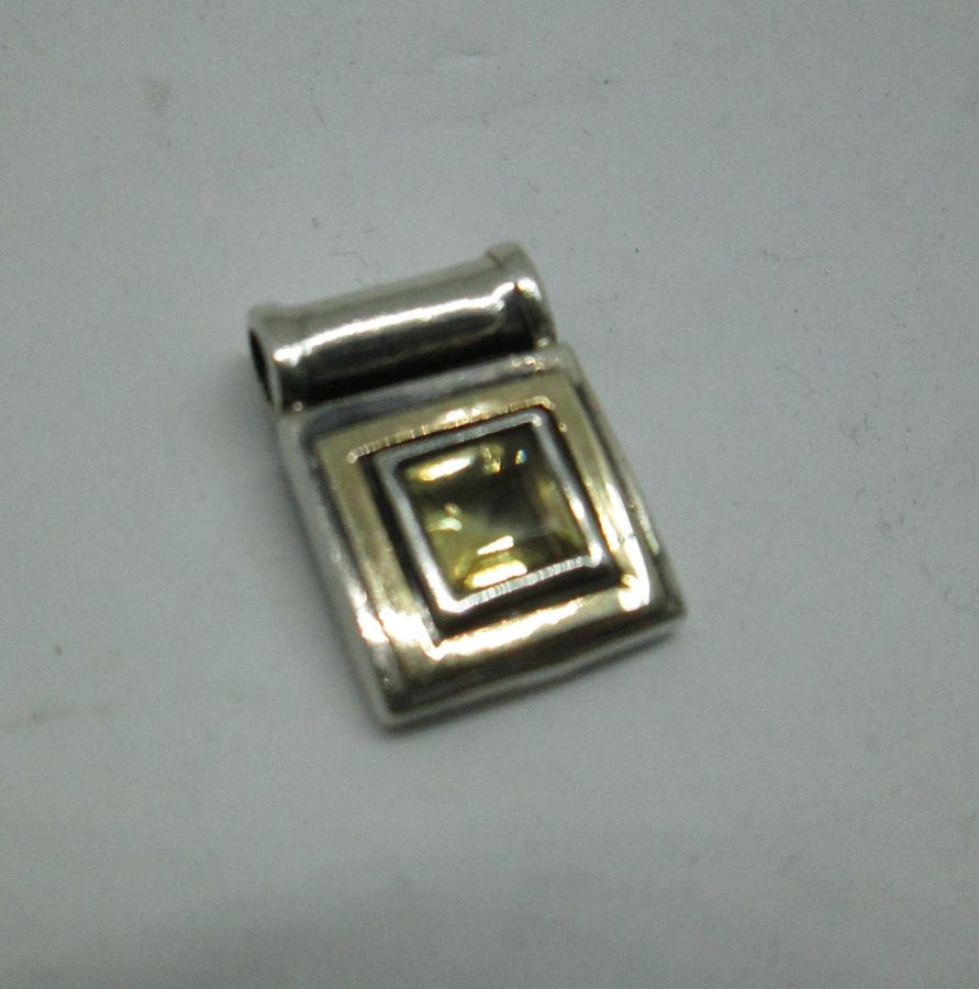 Handmade sterling silver pendant gold Topaz & gold set with gold Topaz contemporary design. Dimension 1.35 cm X 1.35 cm X 0.4 approximately.