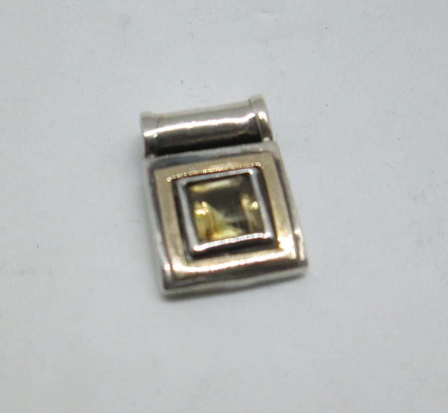 Handmade sterling silver pendant gold Topaz & gold set with gold Topaz contemporary design. Dimension 1.35 cm X 1.35 cm X 0.4 approximately.