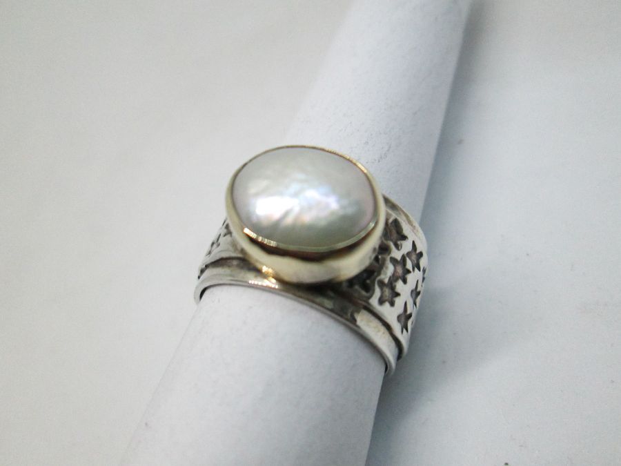 Handmade sterling silver gold Pearl ring 14 carat gold contemporary style ring set with genuine Moby Pearl.