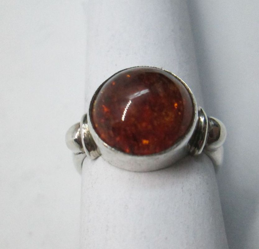Handmade sterling silver contemporary style round Amber silver ring set with real Amber stone. Dimension 1.2 cm X 2 ring, size 54.