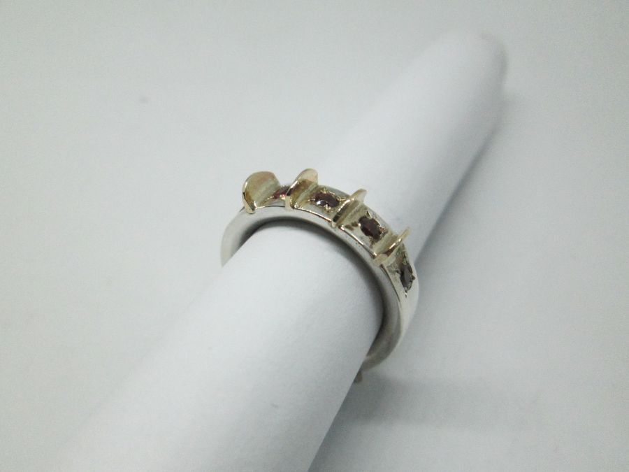 Handmade sterling silver & 14 carat gold contemporary style five Garnet stones ring set with 5 Garnet stone .Dimension 0.5 cm ring size 53.