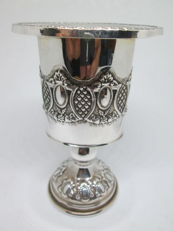 Handmade sterling silver Havdalah candle holder pressed designs around candle holder. Dimension 7.1 cm X 5.5 cm X 10.5 cm approximately.
