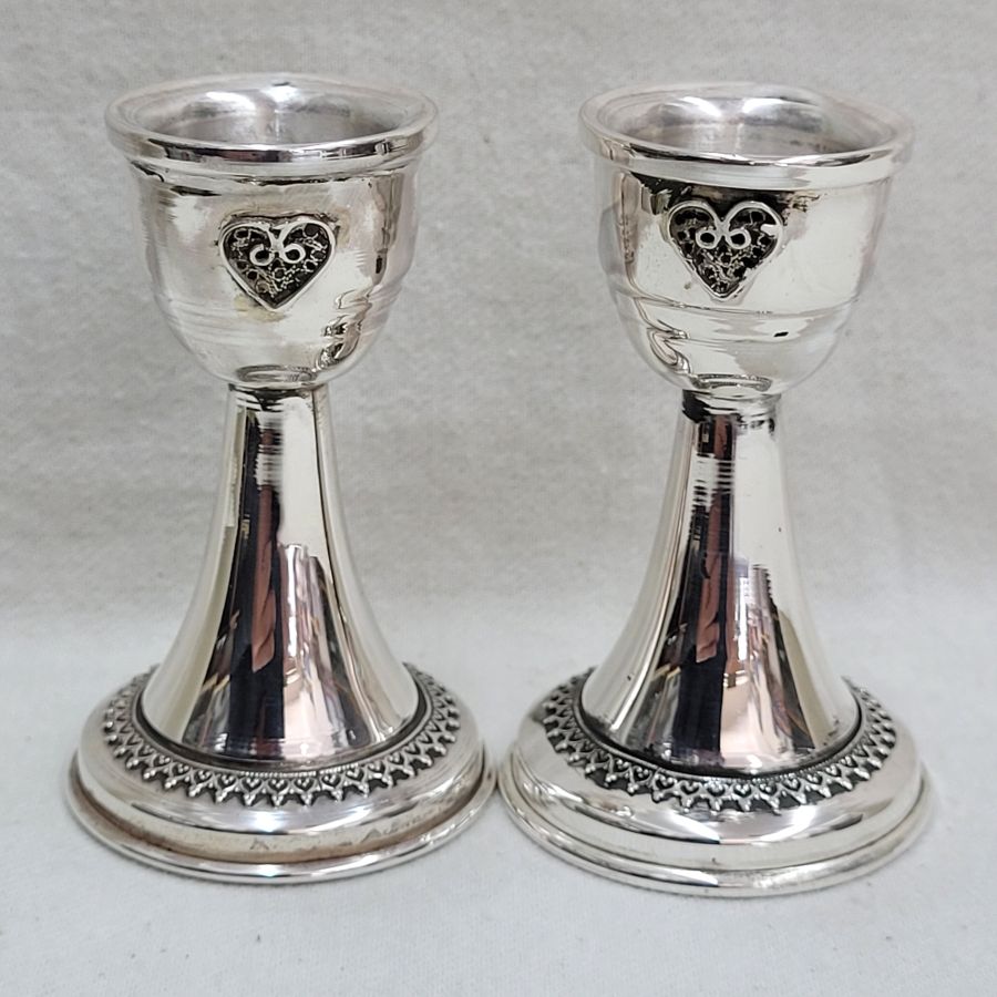 Handmade BathMitzvah Shabbat candle holders sterling silver with Yemenite filigree small heart handmade. Dimension diameter 4.2 cm X 7.2 cm approximately.