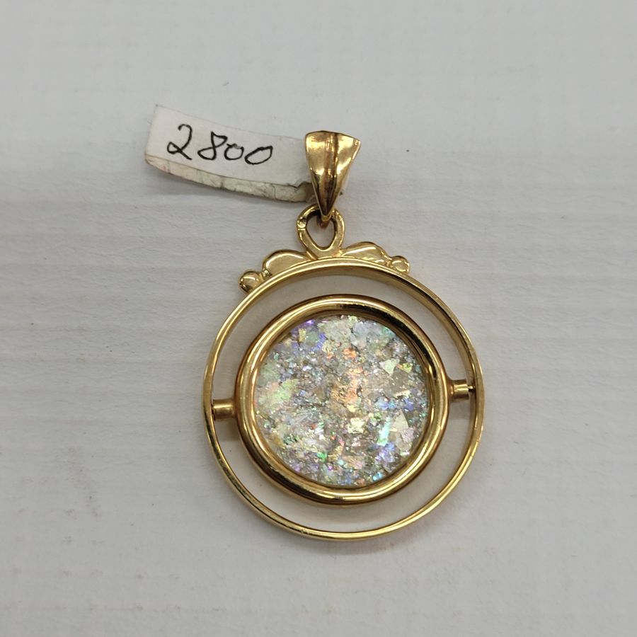 14 Carat Gold Pendant Roman glass Round. 14 carat gold pendant handmade & set with ancient Roman glass pendant that the center piece turns around.