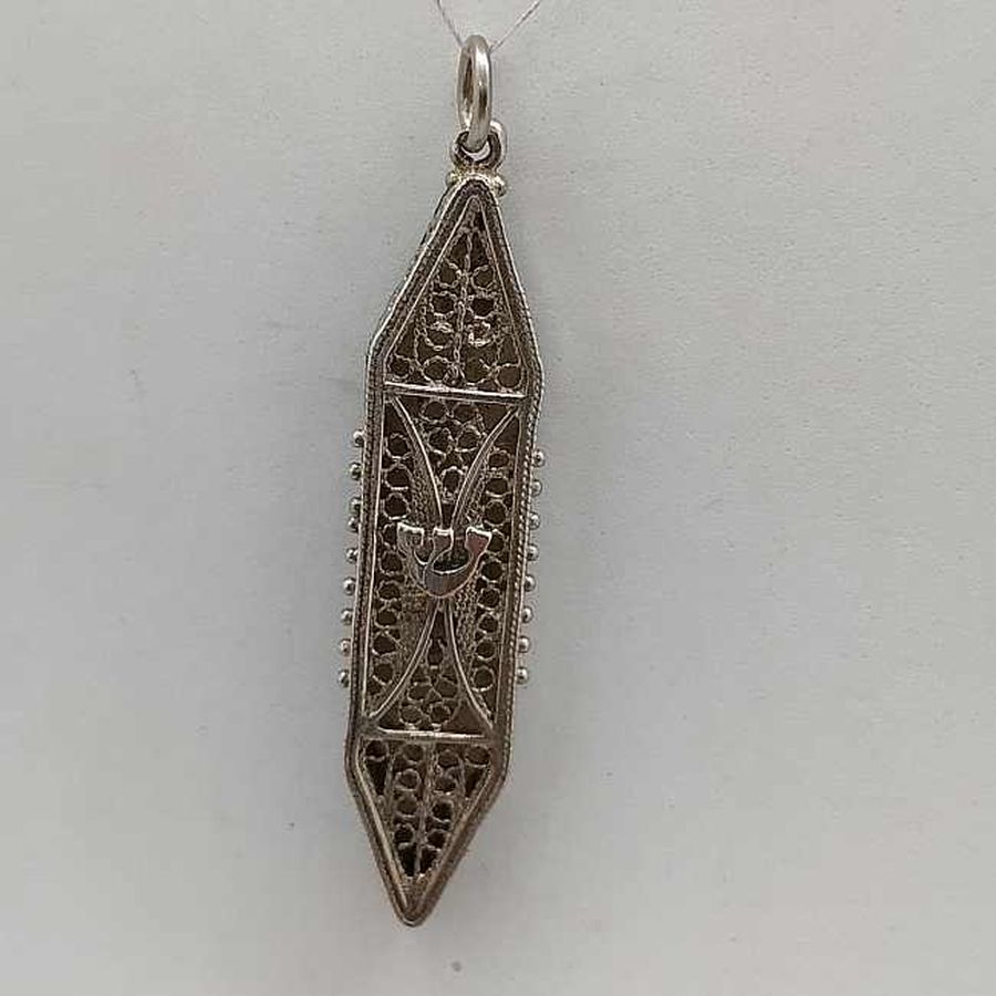 Handmade sterling silver Mezuzah pendant filigree long shape with Yemenite filigree long pendant. Dimension 1.1 cm X 0.4 cm X 4.5 cm approximately.