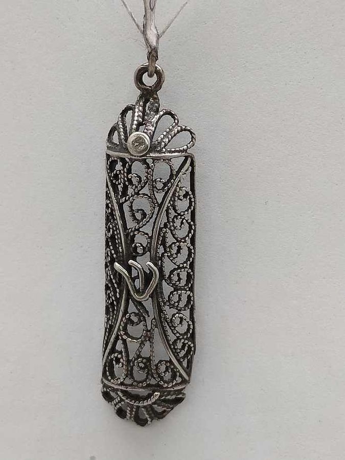 Handmade sterling silver Mezuzah pendant open back with fine Yemenite filigree. Dimension 1 cm X 0.5 cm X 3.7 cm approximately.