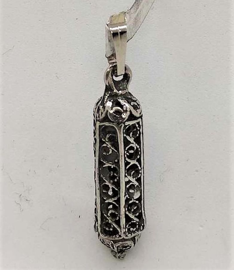 Sterling silver Mezuzah pendant filigree hexagon handmade with Yemenite filigree. Dimension 0.7 cm X 0.7 cm X 2.6 cm approximately.