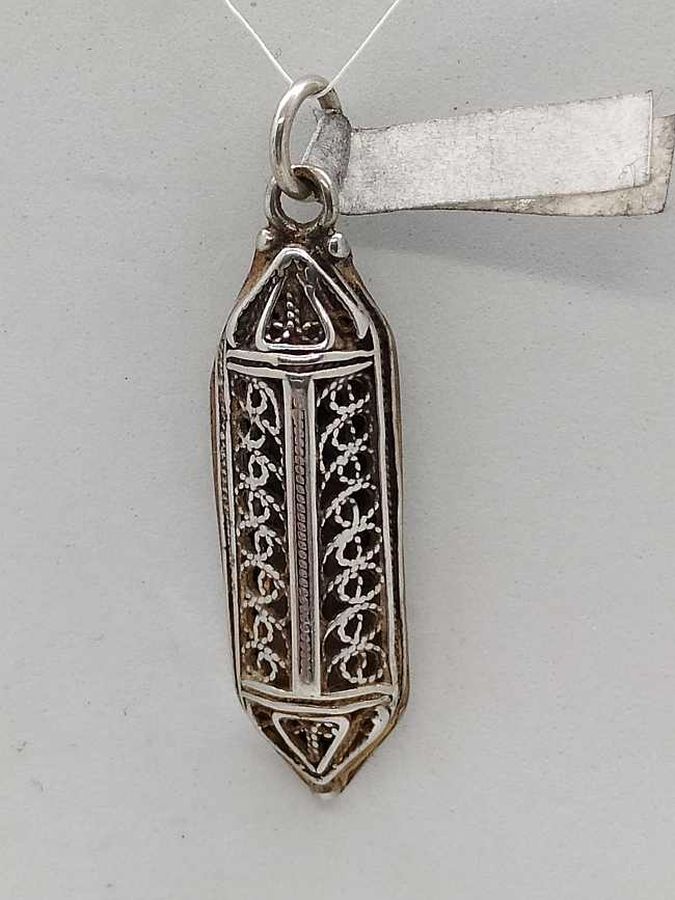 Sterling Silver Mezuzah pendant fine filigree handmade with fine Yemenite filigree triangle shape. Dimension 1 cm X 0.45 cm X 3.1 cm approximately.