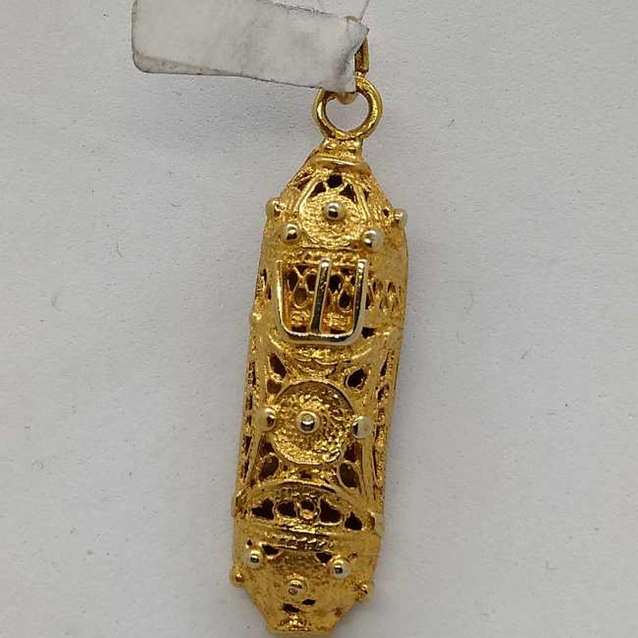 Handmade sterling silver Mezuzah pendant half rounded and gold plated with Yemenite filigree designs. Dimension 1.1 cm X 0.65 cm X 3.4 cm approximately.