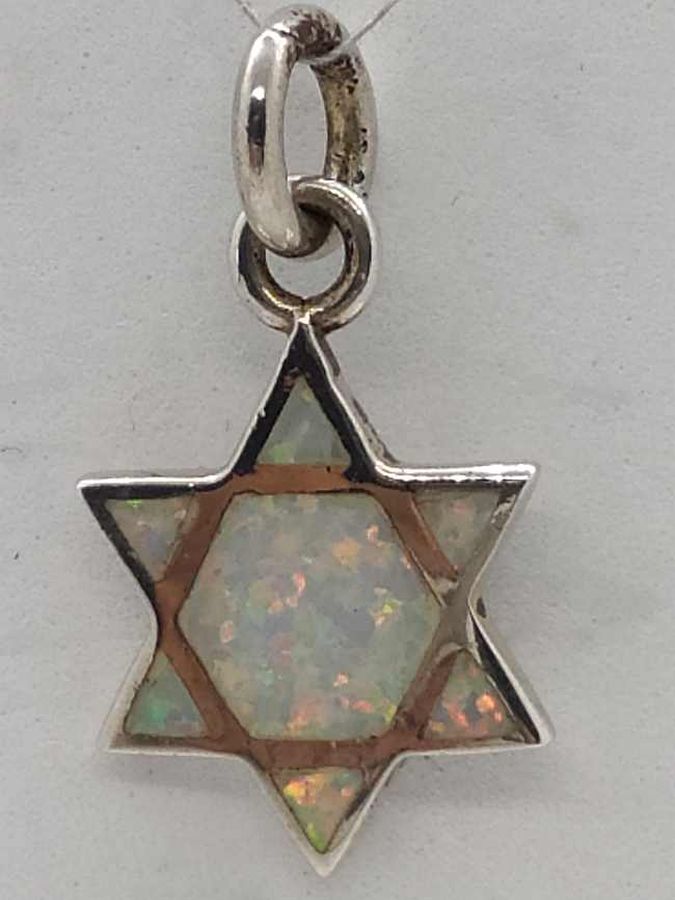 David Star Pendant Opalite is set with 7 opalite stones shaped in as can be seen from both sides. Dimension 1.55 cm X 1.8 cm X 0.24 cm.