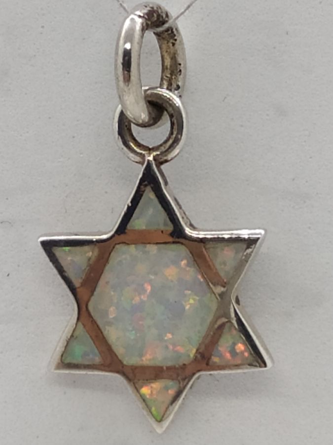 David Star Pendant Opalite is set with 7 opalite stones shaped in as can be seen from both sides. Dimension 1.55 cm X 1.8 cm X 0.24 cm.