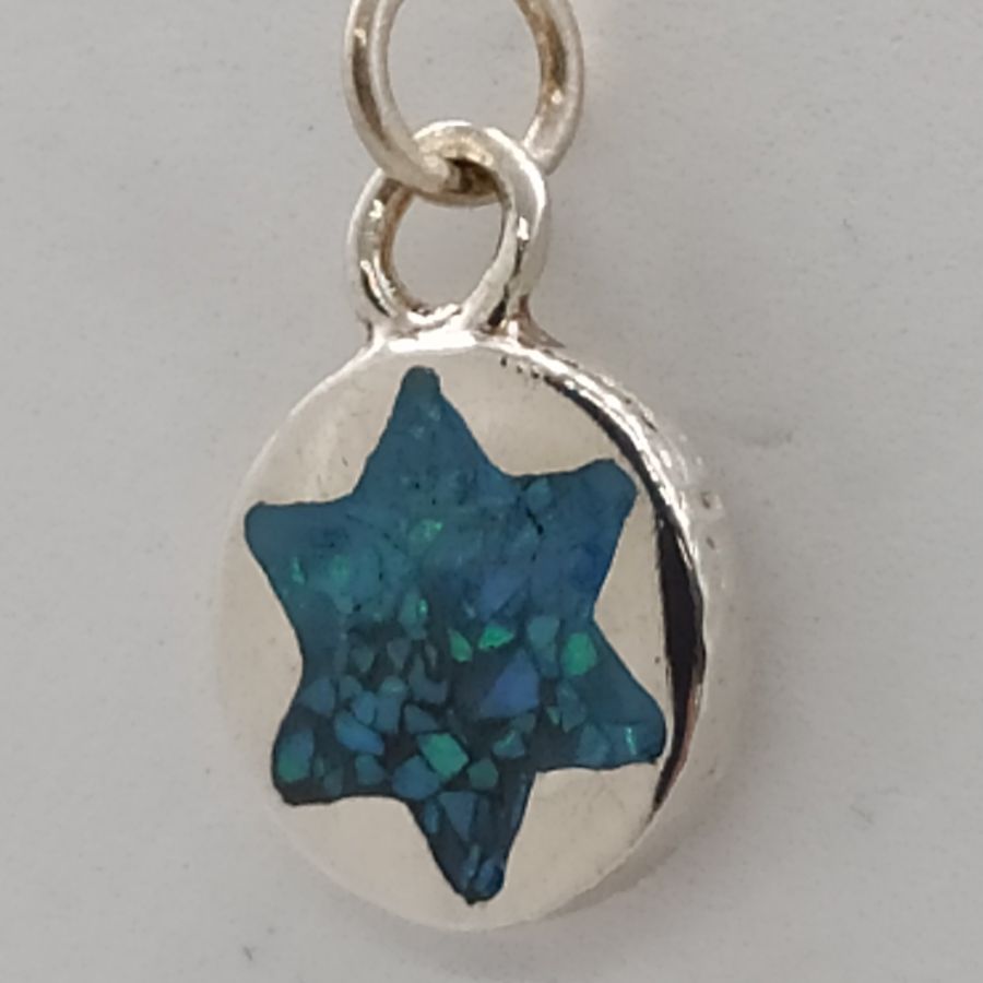 David Star Opalite Round pendant set with opalite stones shaped in a round disk. Dimension diameter 1.3 cm X 0.2 cm approximately.