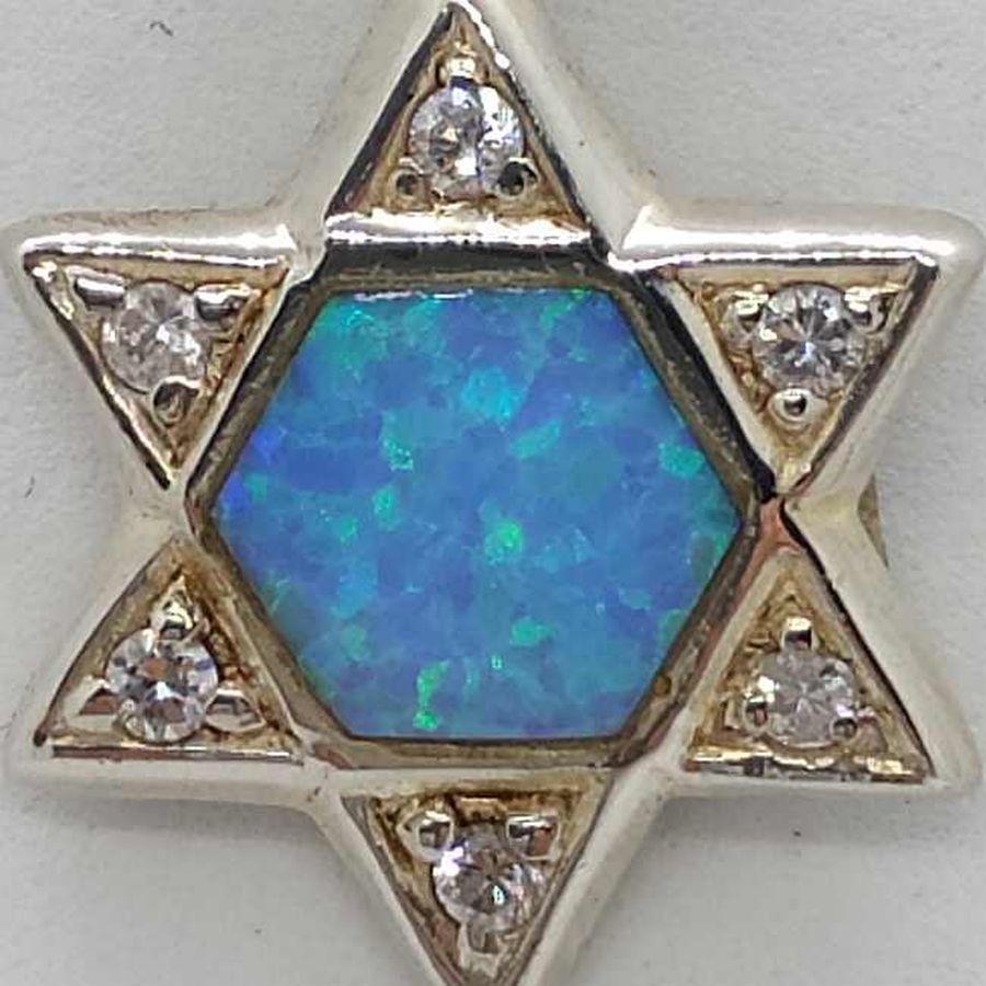 Handmade sterling silver pendant David star with hexagon Opalite in center and set with 6 white zircon stones 1.75 cm X 2 cm X 0.3 cm.