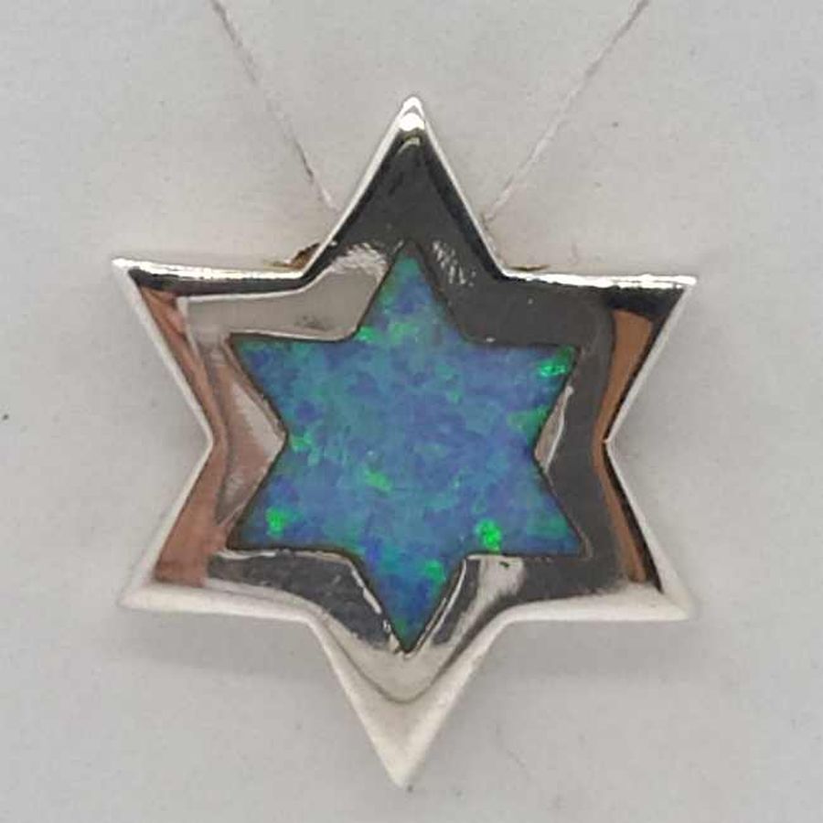 Handmade Magen David Star Opalite stone set in star with 1 opalite stone shaped in a Magen David star shape 1.8 cm X 1.9 cm X 0.35 cm.