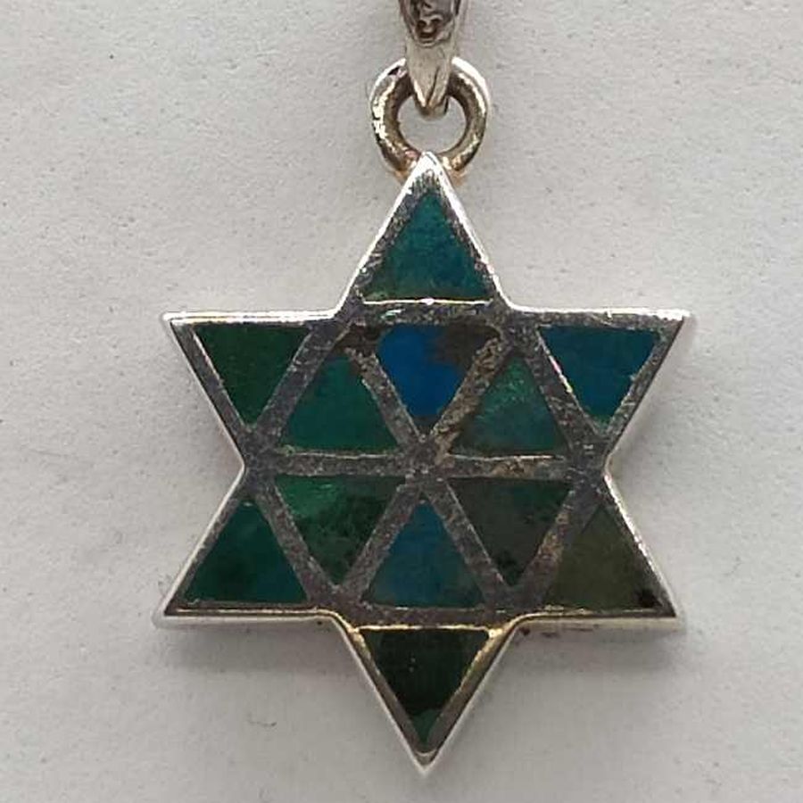 Handmade sterling silver David Star Elat stone Pendant set with 12 Elat stones triangles shaped in. Dimension 1.65 cm X 2 cm X 0.34 cm.