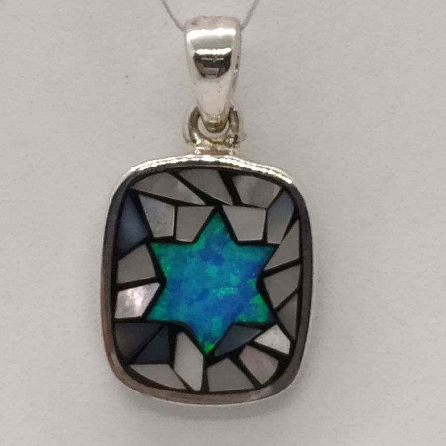 David star Opalite puzzle pendant is set with 1 Opalite stone & pieces of mother of pearl shaped in . Dimension 1.4 cm X 1.65 cm X 0.285 cm.