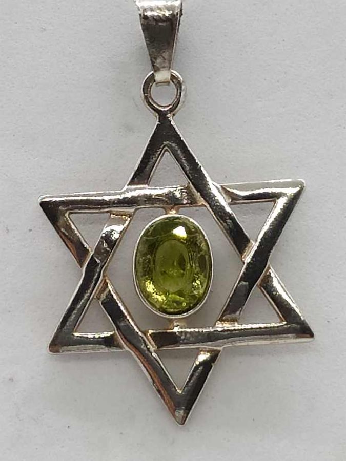 Sterling silver MagenDavid pendant classic Peridot handmade and set with 1 Peridot stone. Dimension 2.35 cm X 2.6 cm X 0.35 cm approximately.