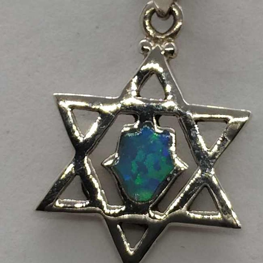 Opalite Hamsa traditional shape set in David Star Opalite Hamsa. The Hamsa is considered as a protection against evil eye.