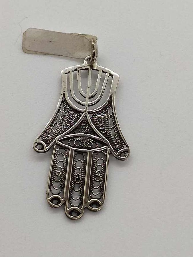 Handmade sterling silver Hamsa Chamsa pendant filigree Menorah and fine Yemenite filigree design. Dimension 2 cm X 3.5 cm X 0.1 cm approximately.