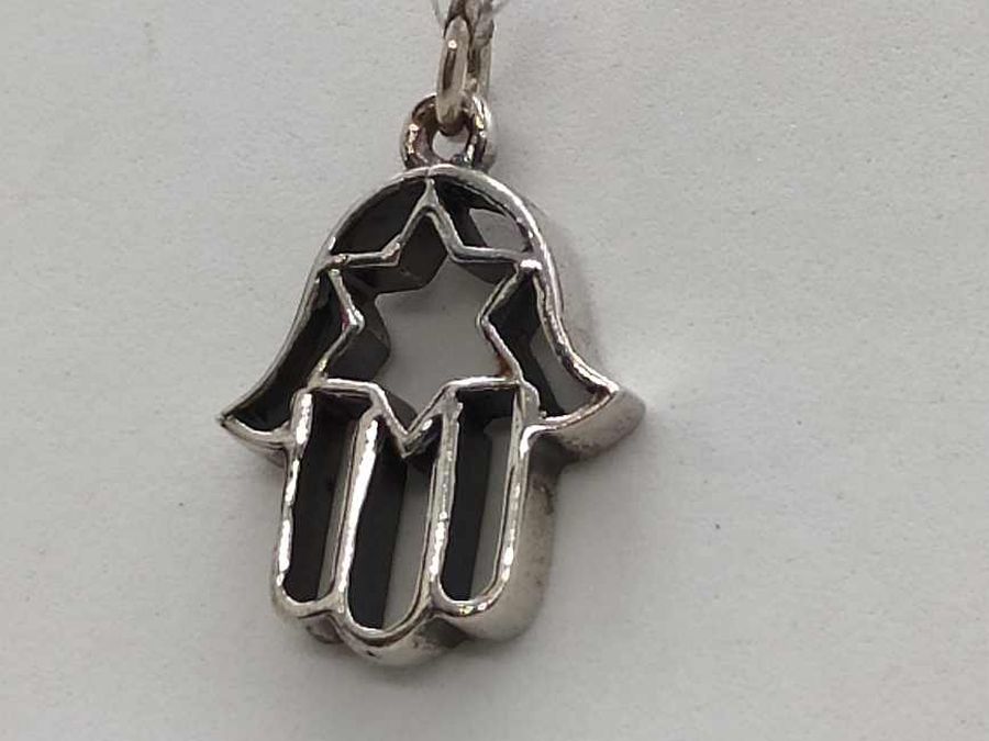Handmade terling silver Hamsa Chamsa pendant Magen David contemporary with star of David. Dimension 2 cm X 1.7 cm X 0.3 cm approximately.