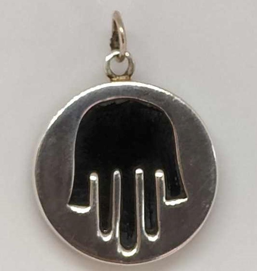 Handmade sterling silver Hamsa Chamsa pendant Onyx set with black Onyx stone cut out silver. Dimension diameter 2.2 cm X 0.4 cm approximately.