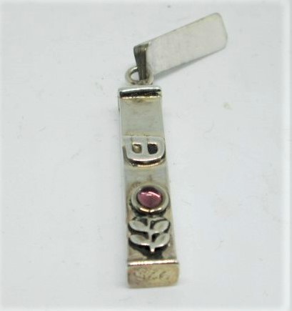 Sterling silver Mezuzah pendant Amethyst handmade by S. Ghatan (Katan) with flower & Amethyst cabochon stone cut 0.65 cm X 0.5 cm X 3.2 cm approximately.
