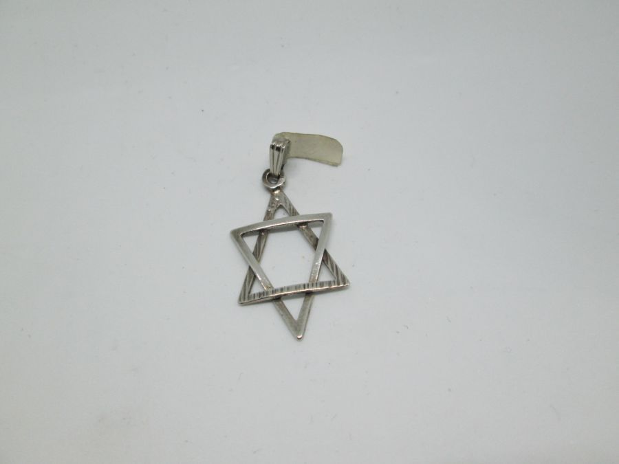 Sterling silver Magen David star triangles pendant modern triangles style handmade. Dimension 1.7 cm X 2.3 cm X 0.15 cm approximately.