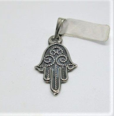 Handmade sterling silver Hamsa Chamsa pendant filigree inlaid with Yemenite filigree inlaid & oxidized. Dimension 1.8 cm X 1.25 cm X 0.1 cm approximately.