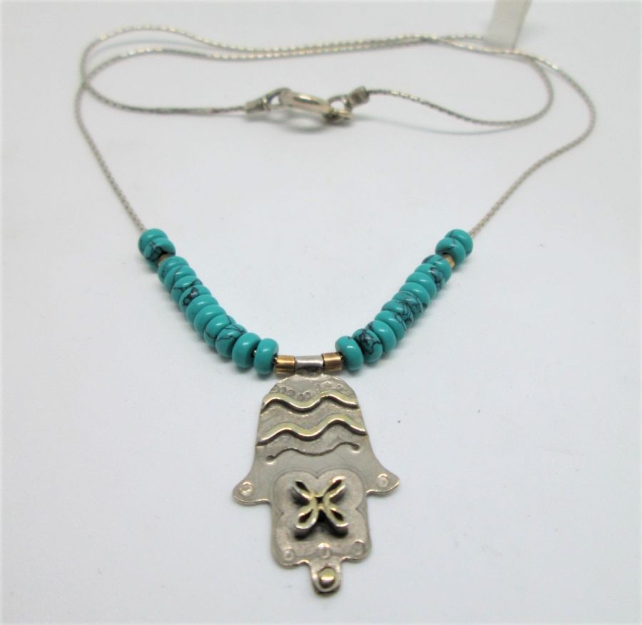 Handmade sterling silver Hamsa Chamsa pendant Turquoises contemporary necklace with Turquoise stones, Hamsa 2.3 cm X 1.6 cm X 0.1 cm chain 44 cm.