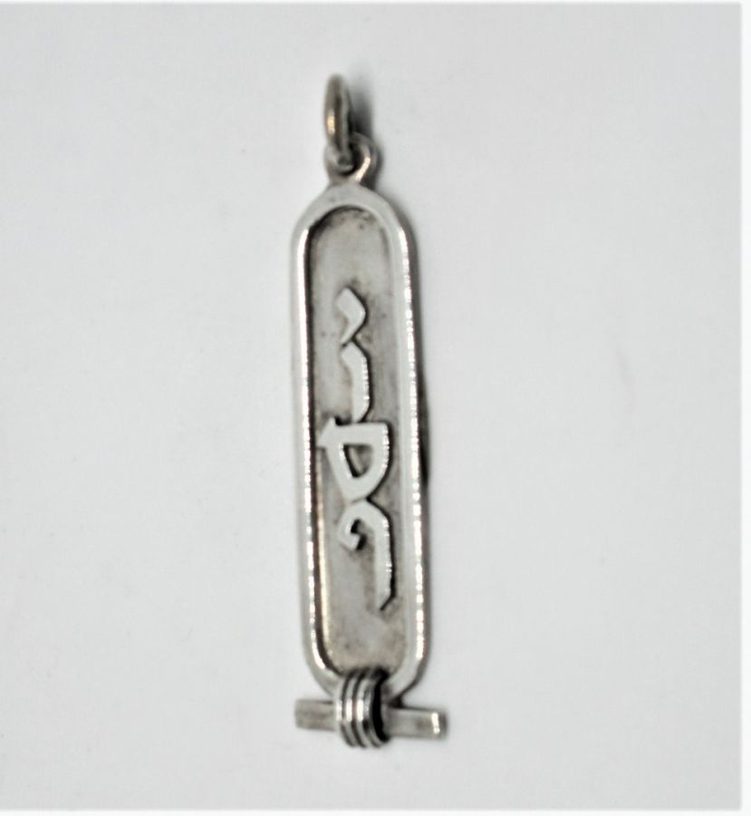 You can order silver name Cartouche pendant Hebrew name pendant by request. Dimension 1 cm X 4 cm X 1.5 cm approximately.