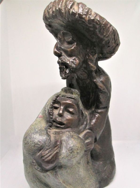 An original bronze sculpture father bride of a Chassid Rabby embracing his young daughter bride covered with greenish patina shawl.