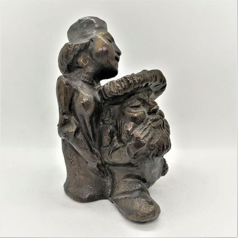 An original bronze sculpture in laws of a Chassid Rabby followed by his devoted pregnant wife at their son wedding handmade by P.Flit.