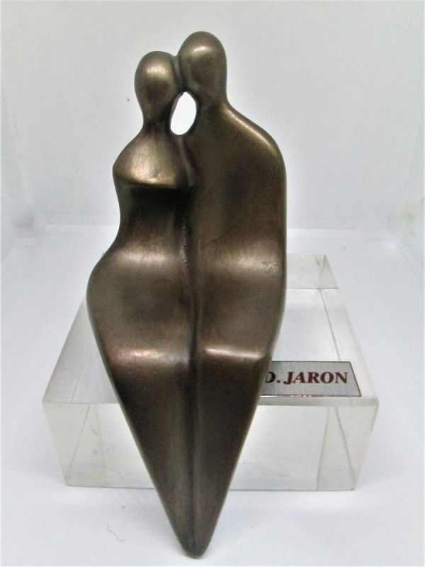 Bronze Sculpture Sitting Couple. Original handmade bronze sculpture a romantic couple kissing handmade by D. Jaron Can be displayed on shelf.