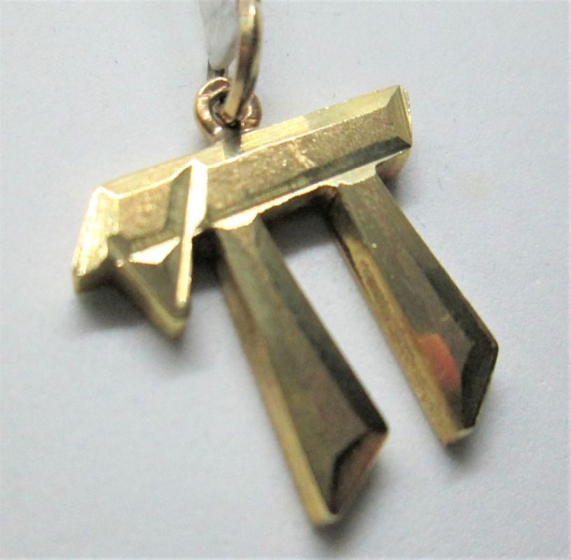 14 carat gold Hay Solid Gold Pendant with diamond cut and sand polish. Dimension 2 cm X 1.75 X 0.25 cm approximately.