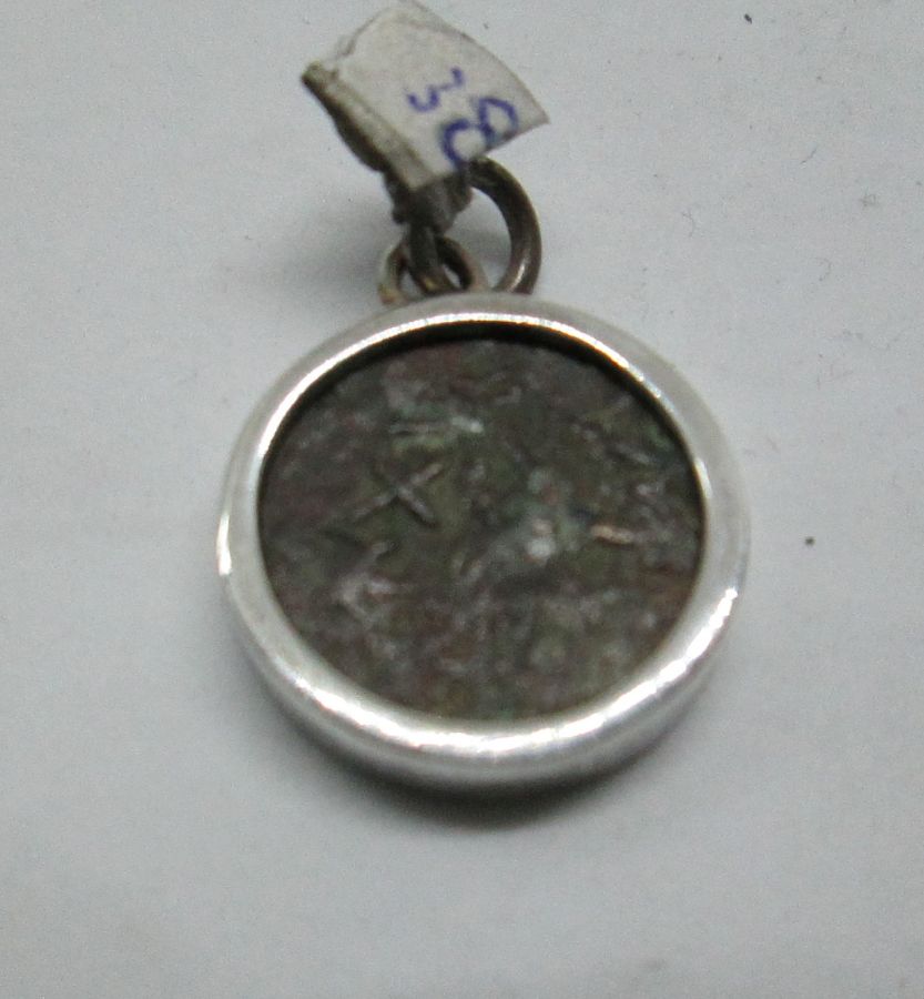Silver Pendant Simple frame set with coin. Sterling silver pendant simple frame smooth set with genuine antique Jewish coin from the first century AD.