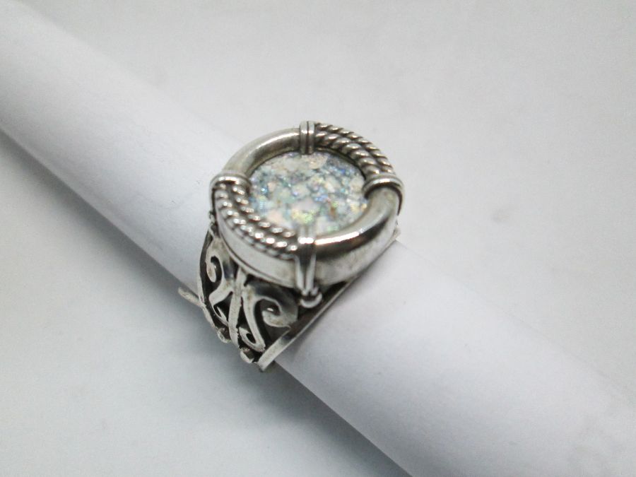 Handmade classic cut out style sterling silver ring antique Roman glass set with a genuine antique Roman glass found in the holyland Israel.