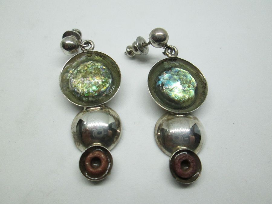 Handmade sterling silver round Roman glass earrings contemporary design set with genuine Roman glass and ceramic ornaments.