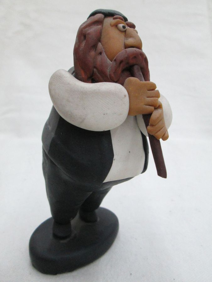 Shabby Rabbi playing flute - Image 3