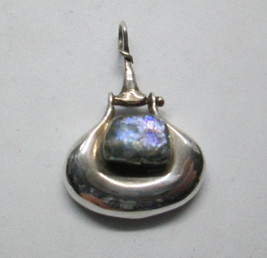 Handmade sterling silver Roman glass smooth pendant set with genuine Roman glass contemporary style. Dimension 2.3 cm X 3 cm approximately.