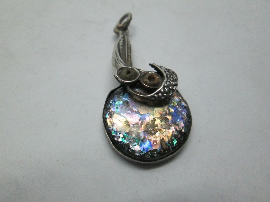 Handmade sterling silver pendant set with genuine Roman glass contemporary style. Dimension 1.8 cm X 3.7 cm approximately.