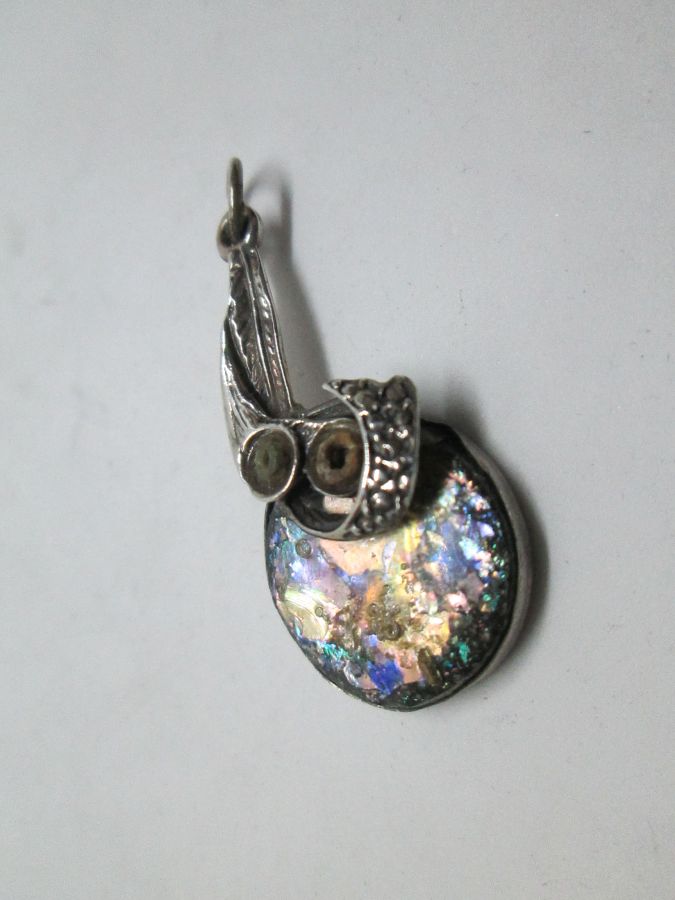 Handmade sterling silver pendant set with genuine Roman glass contemporary style. Dimension 1.8 cm X 3.7 cm approximately.